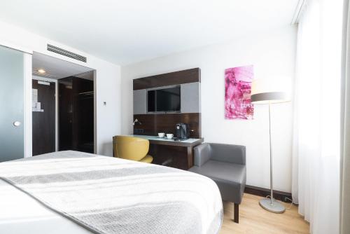 Imagen de la habitación del Hotel Leonardo Hotel Vienna Westbahnhof. Foto 18