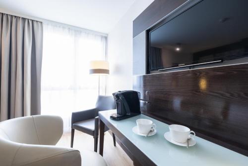 Imagen de la habitación del Hotel Leonardo Hotel Vienna Westbahnhof. Foto 19