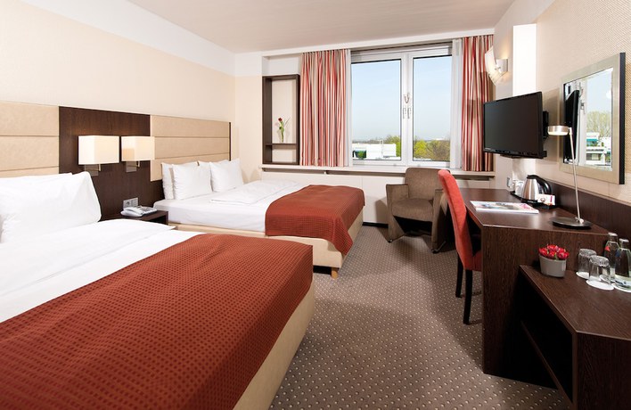 Imagen de la habitación del Hotel Leonardo Munich Arabellapark. Foto 11