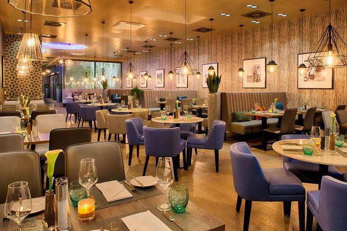 Imagen del bar/restaurante del Hotel Leonardo Munich City East. Foto 11