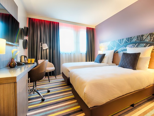 Imagen de la habitación del Hotel Leonardo Munich City East. Foto 13