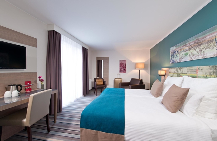 Imagen de la habitación del Hotel Leonardo Munich City Olympiapark. Foto 16