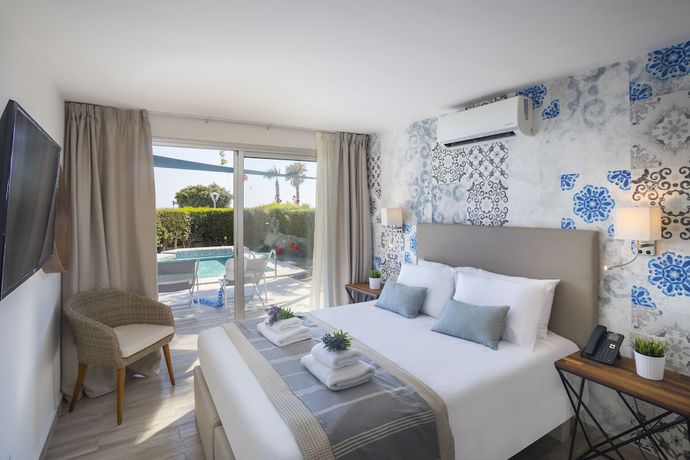 Imagen de la habitación del Hotel Leonardo Plaza Cypria Maris Beach and Spa. Foto 16