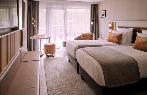 Imagen de la habitación del Hotel Leonardo Royal Baden. Foto 9