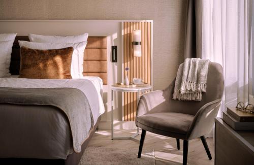 Imagen de la habitación del Hotel Leonardo Royal Baden. Foto 15