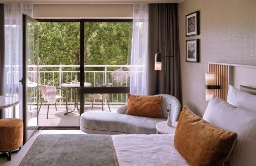 Imagen de la habitación del Hotel Leonardo Royal Baden. Foto 17