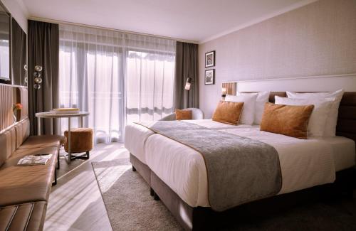 Imagen de la habitación del Hotel Leonardo Royal Baden. Foto 18