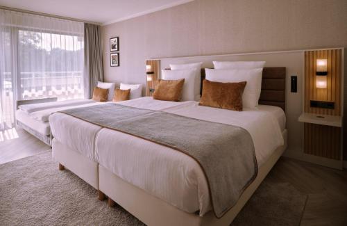 Imagen de la habitación del Hotel Leonardo Royal Baden. Foto 20