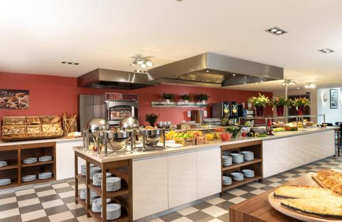 Imagen del bar/restaurante del Hotel Leonardo Royal Berlin Alexanderplatz. Foto 10