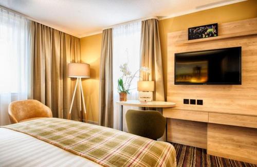 Imagen de la habitación del Hotel Leonardo Royal Edinburgh Haymarket. Foto 17