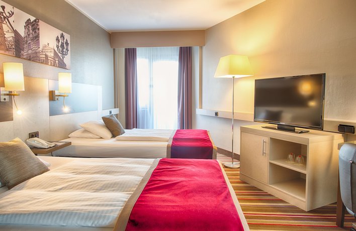 Imagen de la habitación del Hotel Leonardo Royal Frankfurt. Foto 5