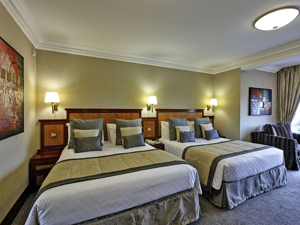 Imagen de la habitación del Hotel Leonardo Royal London City. Foto 5