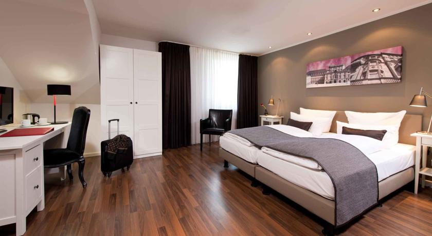 Imagen de la habitación del Hotel Leonardo Royal Mannheim. Foto 7