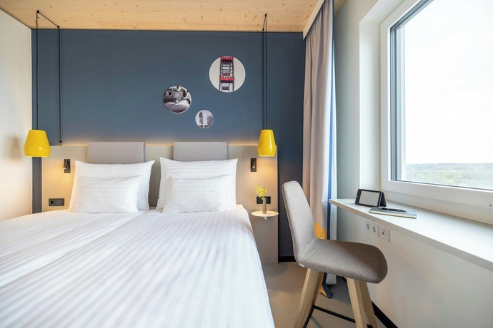 Imagen de la habitación del Hotel Leonardo Smart Vienna Airport. Foto 10