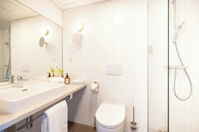 Imagen de la habitación del Hotel Leonardo Smart Vienna Airport. Foto 12