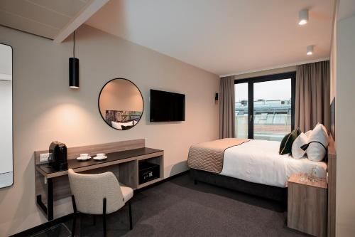 Imagen de la habitación del Hotel Leonardo Vienna City West. Foto 16