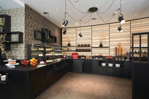 Imagen del bar/restaurante del Hotel Leonardo Vienna City West. Foto 9