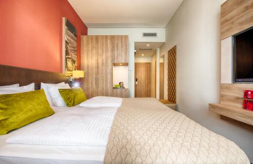 Imagen de la habitación del Hotel Leonardo Wolfsburg City Center. Foto 19