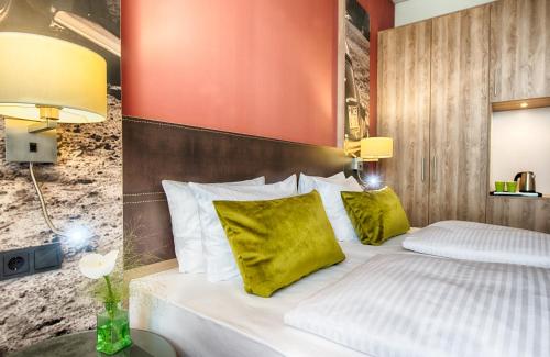 Imagen de la habitación del Hotel Leonardo Wolfsburg City Center. Foto 20