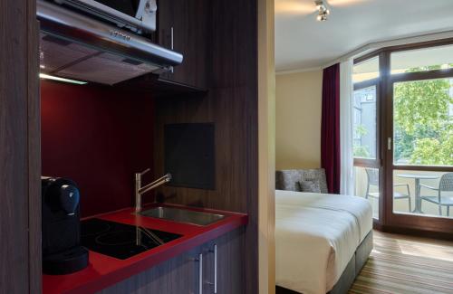 Imagen de la habitación del Hotel Leonardo and Residenz M&uuml;nchen. Foto 17