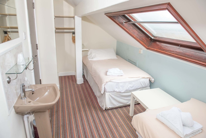 Imagen de la habitación del Hotel Leonardo's Guest House. Foto 6