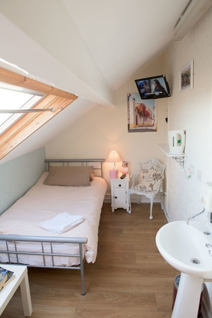 Imagen de la habitación del Hotel Leonardo's Guest House. Foto 8