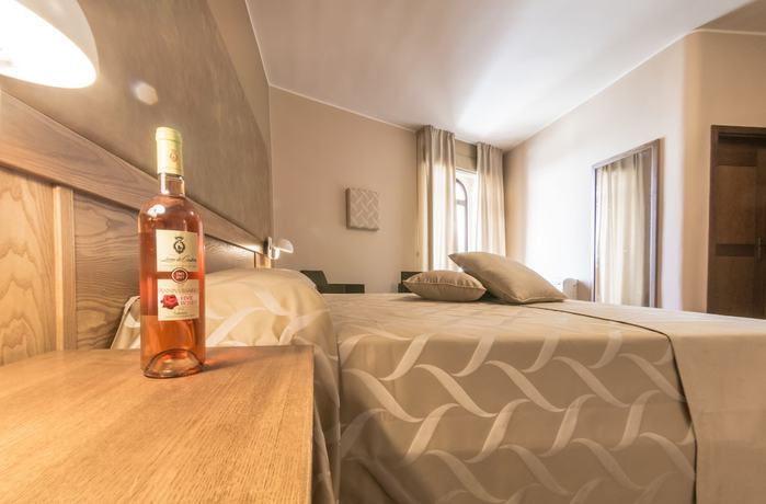 Imagen de la habitación del Hotel Leone De Castris Wine Hotel. Foto 8