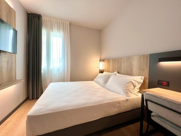 Imagen de la habitación del Hotel Leonessa, Brescia. Foto 9