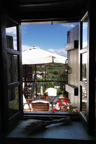 Imagen de la habitación del Hotel Leonidas Village Houses. Foto 4