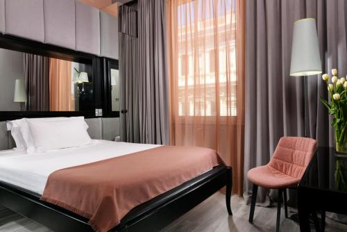 Imagen de la habitación del Hotel Leon's Place. Foto 19