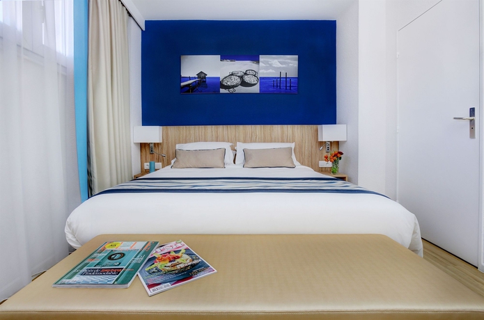 Imagen de la habitación del Hotel Lepoussin. Foto 7