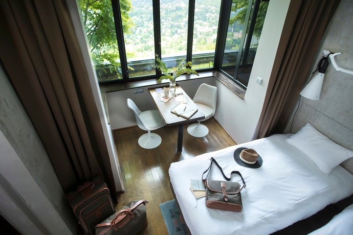 Imagen de la habitación del Hotel L'ermitage Cuisine-à-manger. Foto 5