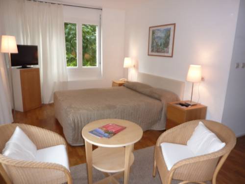 Imagen de la habitación del Hotel L'ermitage. Foto 15