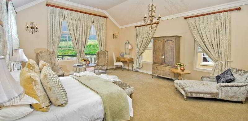 Imagen de la habitación del Hotel L'ermitage Franschhoek Chateau and Villas. Foto 15
