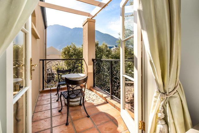 Imagen de la habitación del Hotel L'ermitage Franschhoek Chateau and Villas. Foto 26