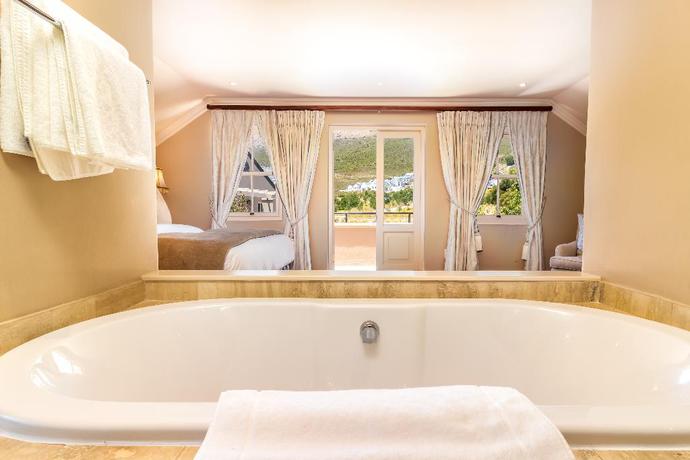 Imagen de la habitación del Hotel L'ermitage Franschhoek Chateau and Villas. Foto 27
