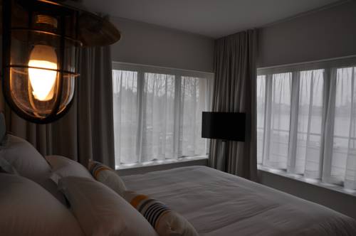 Imagen de la habitación del Hotel Les 3 Lieux. Foto 6