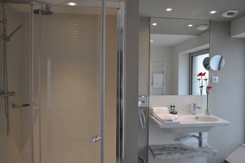 Imagen de la habitación del Hotel Les 3 Lieux. Foto 7