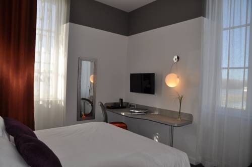 Imagen de la habitación del Hotel Les 3 Lieux. Foto 8