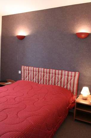 Imagen de la habitación del Hotel Les 3 Marchands. Foto 5