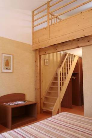 Imagen de la habitación del Hotel Les 3 Marchands. Foto 6