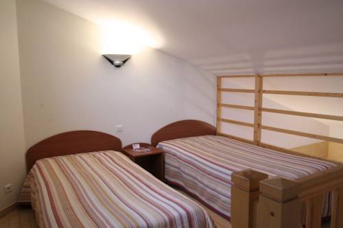 Imagen de la habitación del Hotel Les 3 Marchands. Foto 7