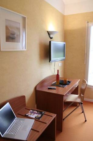 Imagen de la habitación del Hotel Les 3 Marchands. Foto 9