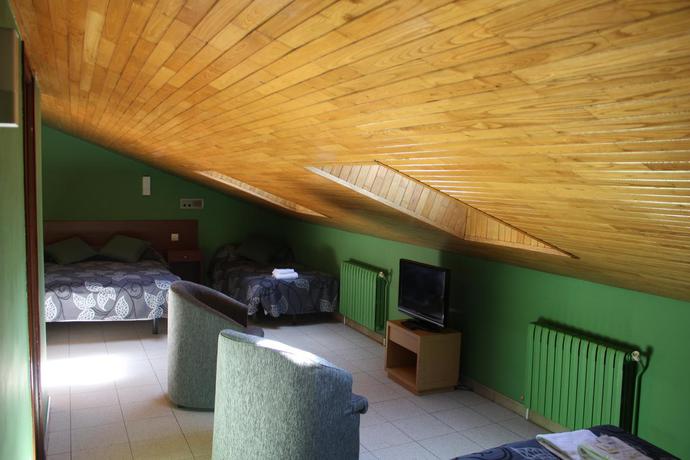 Imagen de la habitación del Hotel Les 7 Claus. Foto 3