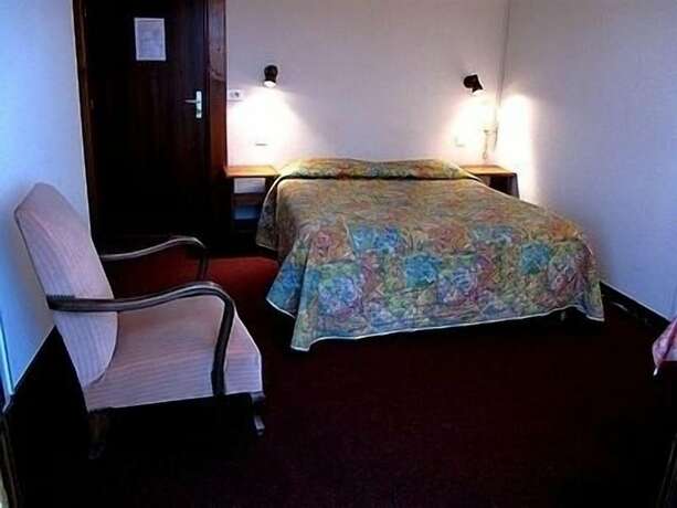 Imagen de la habitación del Hotel Les Acacias Bellevue. Foto 19