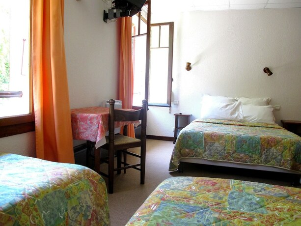 Imagen de la habitación del Hotel Les Acacias Bellevue. Foto 20