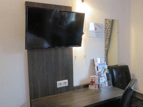 Imagen de la habitación del Hotel Les Afforêts. Foto 7