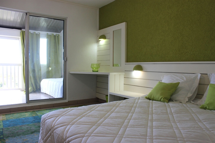 Imagen de la habitación del Hotel Les Aigrettes. Foto 12