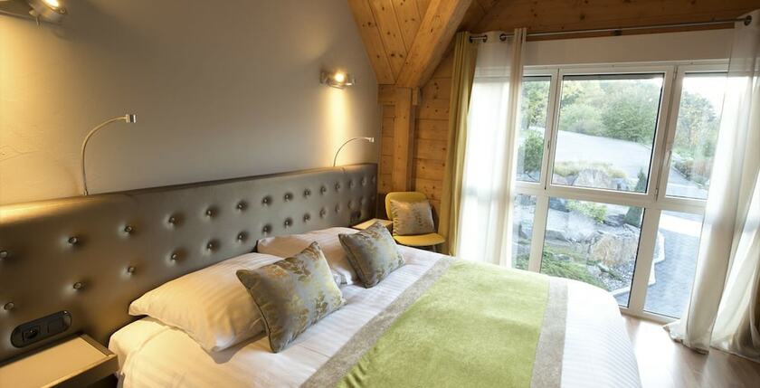 Imagen de la habitación del Hotel Les Alisiers. Foto 11