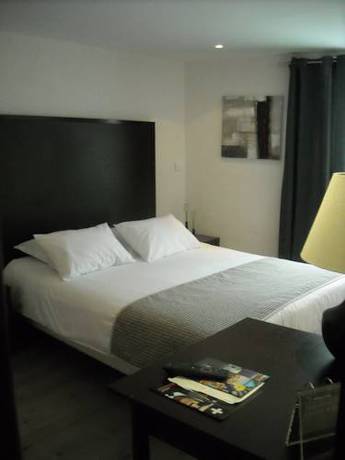 Imagen de la habitación del Hotel Les Alpes. Foto 16